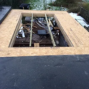 A roof with a hole in the middle of it.